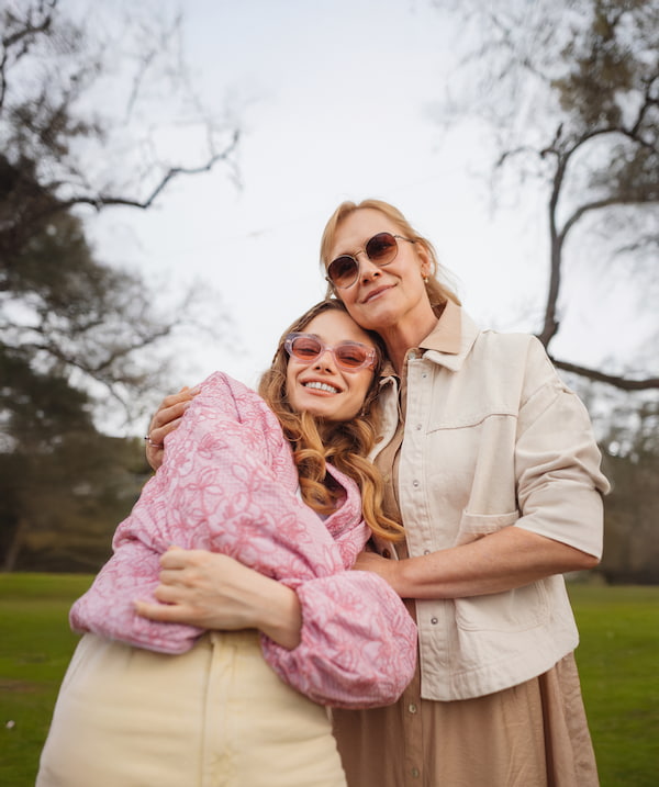 Mother and daughter with round glasses